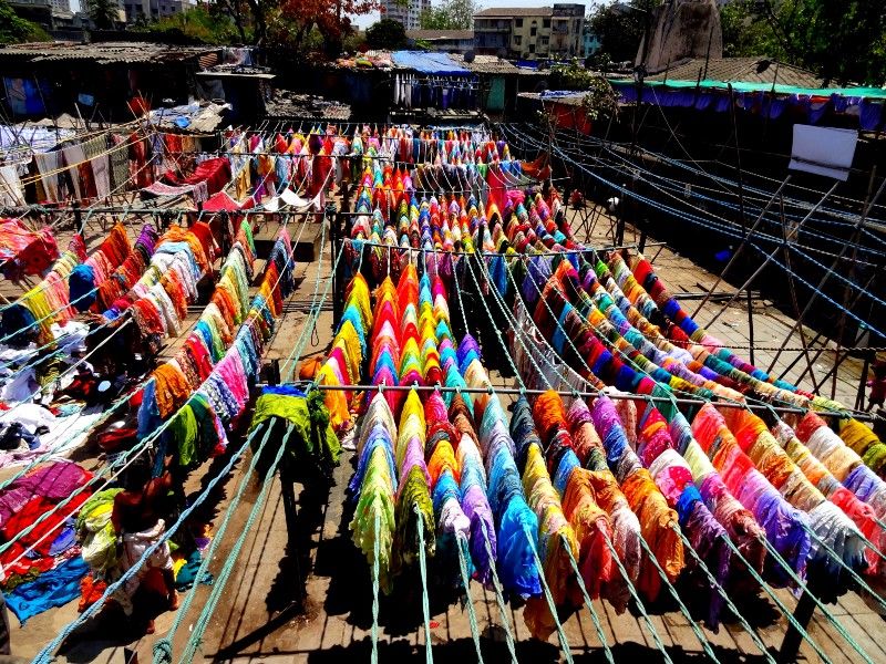 Mumbai- Dhobhi Ghat Private tour with Local Train Ride.